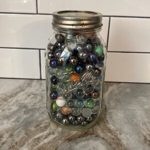 Vintage quart jar of vintage marbles. Colorful collectible